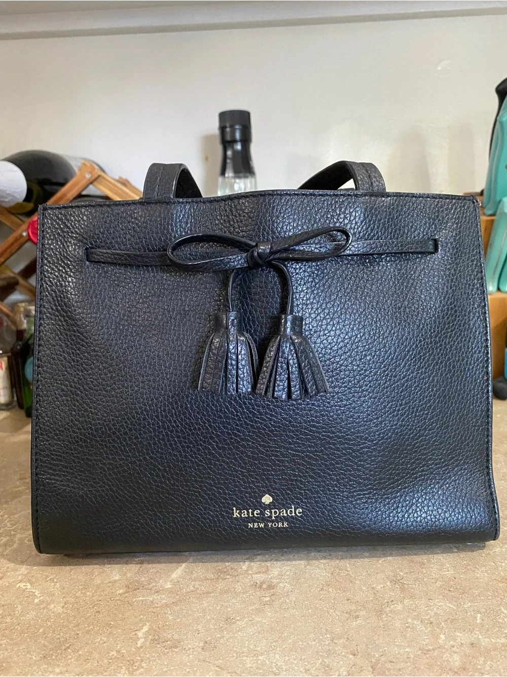 kate spade Black Pebbled Leather Satchel with Tassels with Flaws on top handle